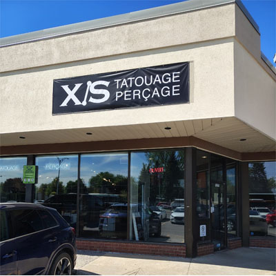 XS TATTOOS & PERCINGS